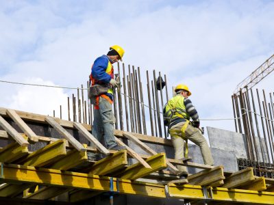 workers-examining-work (1)-min